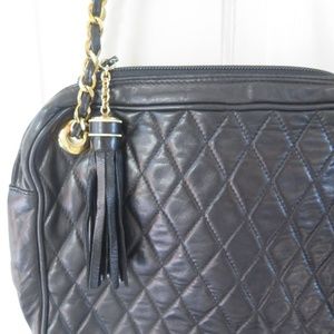 black leather quilted purse